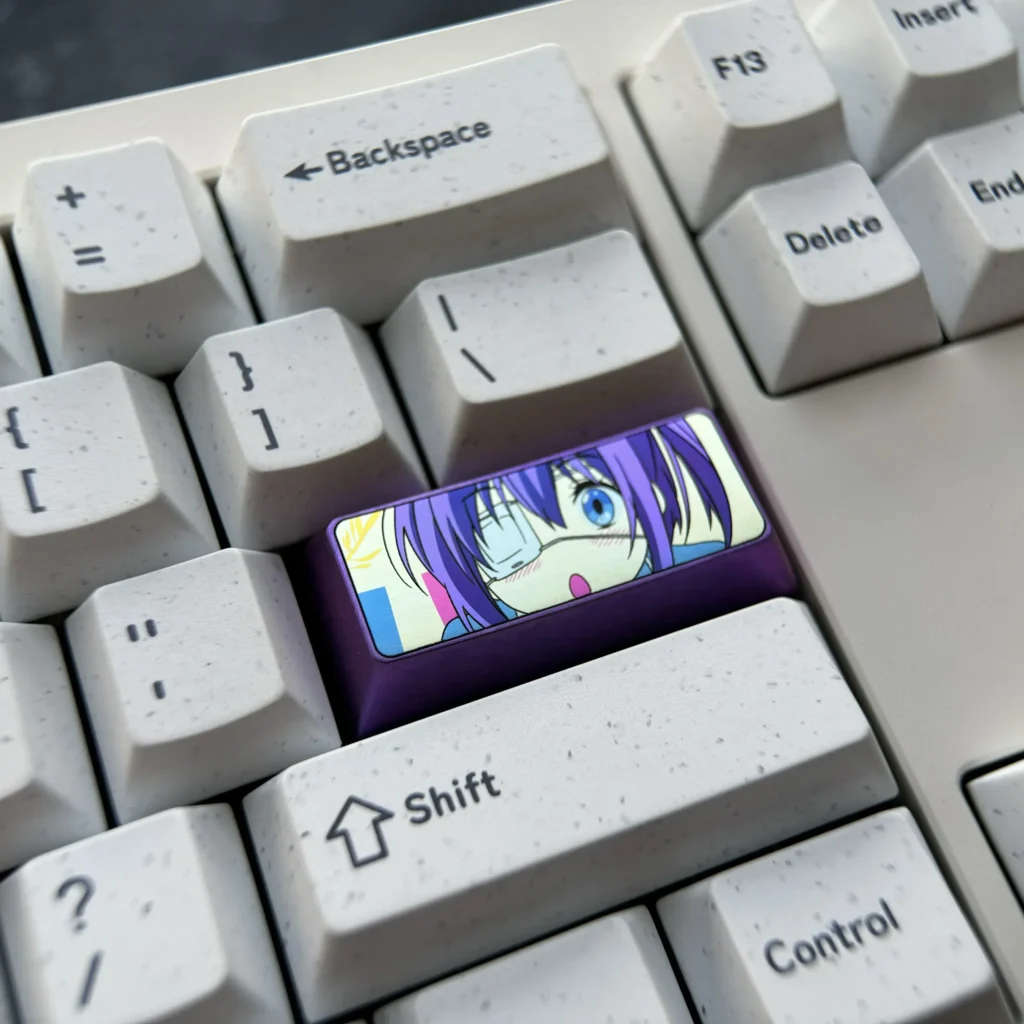 Rikka Takanashi Premium Titanium Anime Keycap. Multi-angle view of vibrant metallic sheen and intricate custom details.