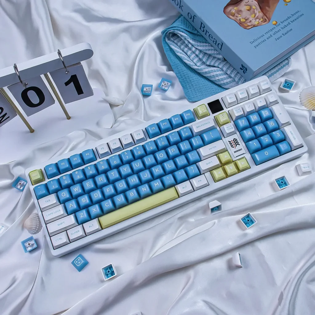 Delightful SA Profile Keycaps Set in a refreshing Sea Salt Ice Cream theme, showcasing cool pastel blues and translucent whites.