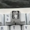 Premium Sakurajima Mai titanium keycap, meticulously engraved with anime art, exhibiting its exquisite metallic finish and artisan craftsmanship.