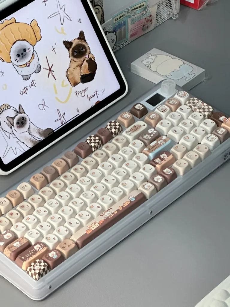 A delightful gallery showcasing the adorable Siamese cat bakery keycap set, highlighting its unique whimsical pastel designs and comfortable MOA Profile.