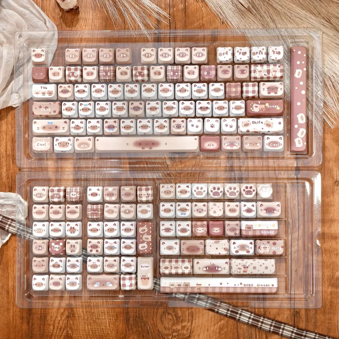 Elegant Siamese cat keycap set showcasing exquisite dye-sublimated PBT with warm coffee tones and intricate feline motifs.