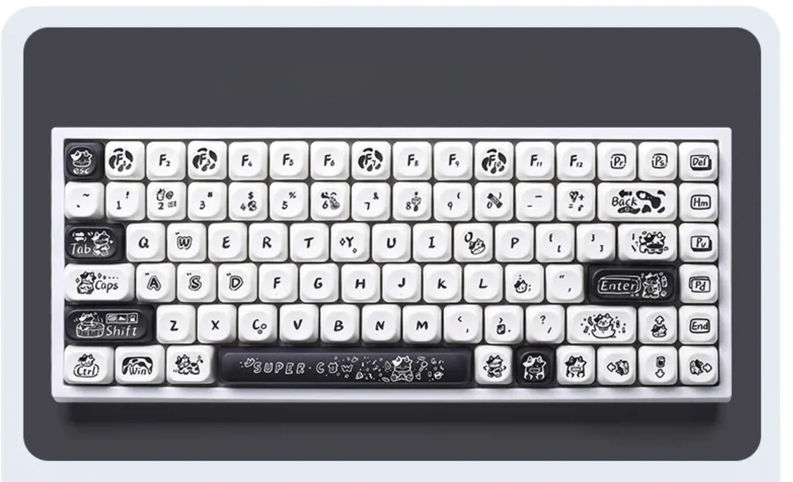 Whimsical Super Cow keycaps set showcasing durable PBT dye-sub MOA profile. A full set with charming black and white cow and farm designs.