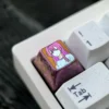 Sakura Akino Keycaps displaying an enchanting character design. Mystical uce crystal style for an anime-inspired desktop.