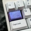 Ice Crystal Titanium Keycap, crafted from premium titanium alloy, showcasing its shimmering, jewel-like facets for custom mechanical keyboards.