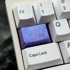 Ice Crystal Titanium Keycap, crafted from premium titanium alloy, showcasing its shimmering, jewel-like facets for custom mechanical keyboards.