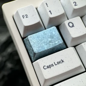 Product display of the strikin Ice Crystal Titanium Keycap, highlighting its premium titanium alloy and intricate, shimmering jewel-like design.