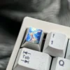 A stunning Vibrant Anime Titanium Wave Keycap featuring a dynamic sculpted ocean wave and reflective premium metallic finish.