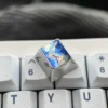 Vibrant Anime Titanium Wave Keycap collection, showcasing its premium metallic finish and dynamic ocean-inspired design from various artistic angles.