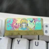 Handcrafted titanium alloy Violet Evergarden Enter keycap, showcasing exquisite anime art with vibrant metallic elegance and ethereal beauty.