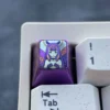 A Virtual YouTuber: Ninomae Ina'Nis Keycaps with a rich purple metallic luster, highlighting its sleek modern design and premium finish.