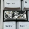 Close-up of a precision-engraved titanium keycap, showcasing intricate vibrant designs and lustrous finish, elevating keyboard artistry.
