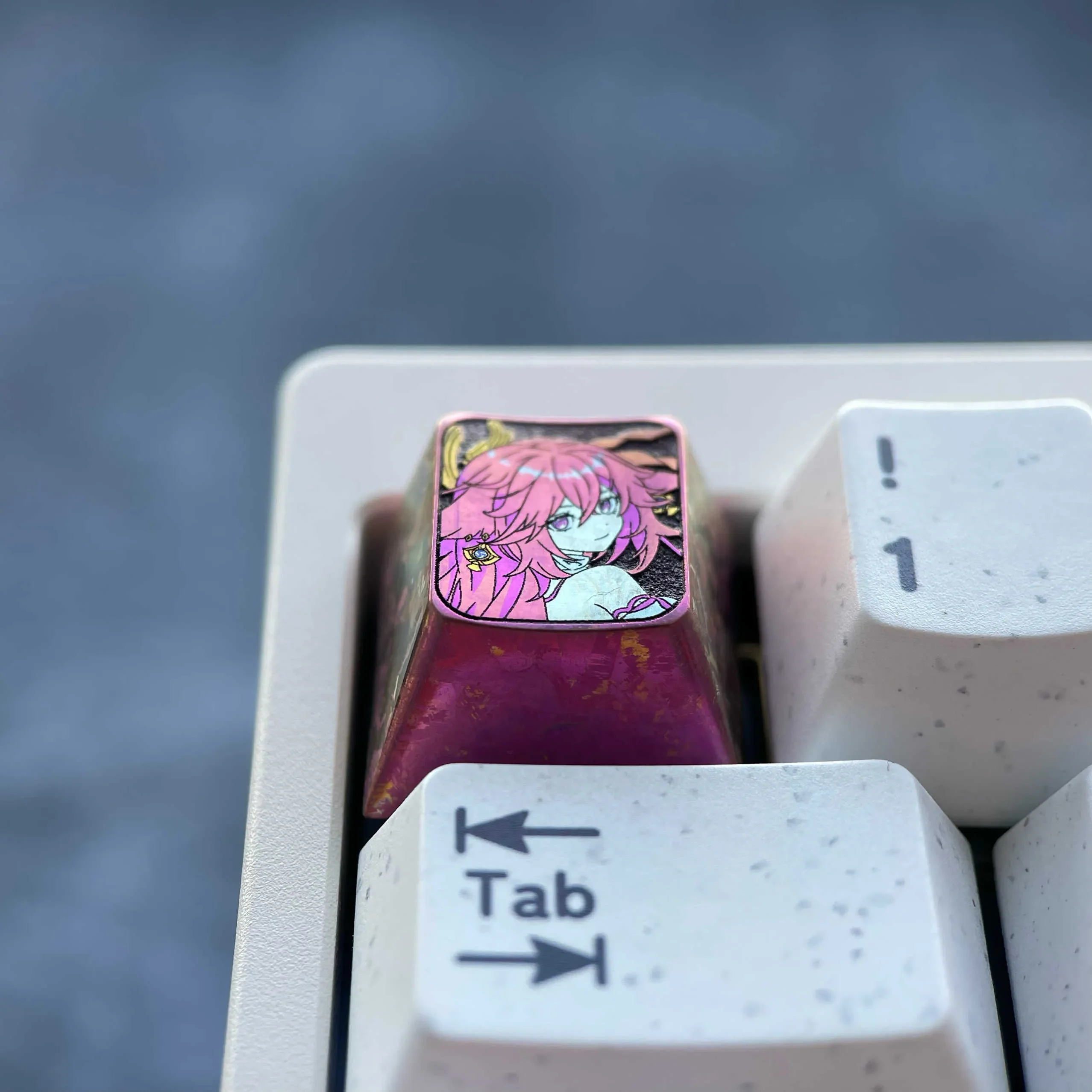 Detailed product gallery of the exquisite anodized titanium Yae Miko keycap, showcasing its mystical red crystalline shimmer and divine elegance design.