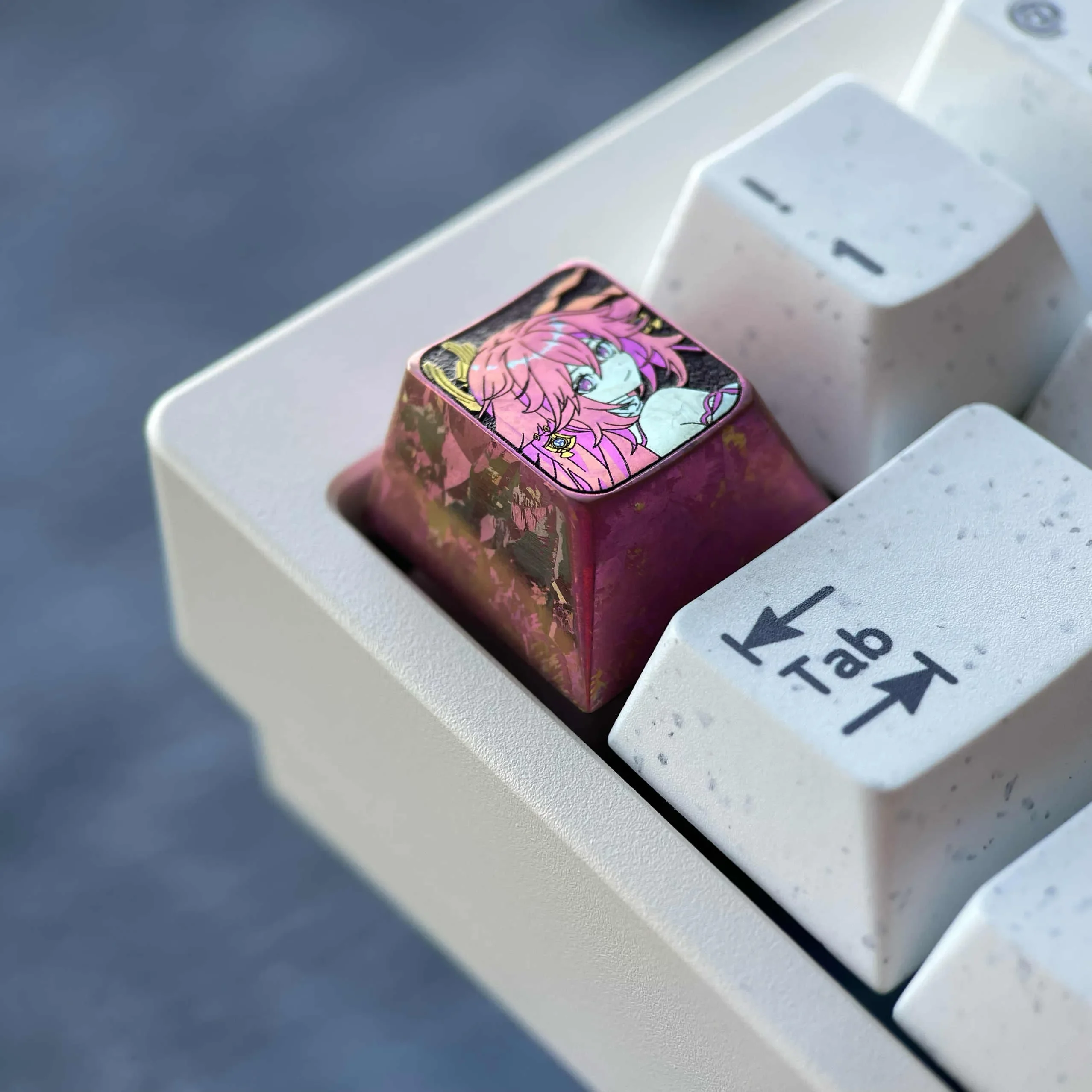 Exquisite anodized titanium Yae Miko keycap gallery. Capturing its mystical red shimmer and divine elegance from multiple angles for custom purpose.