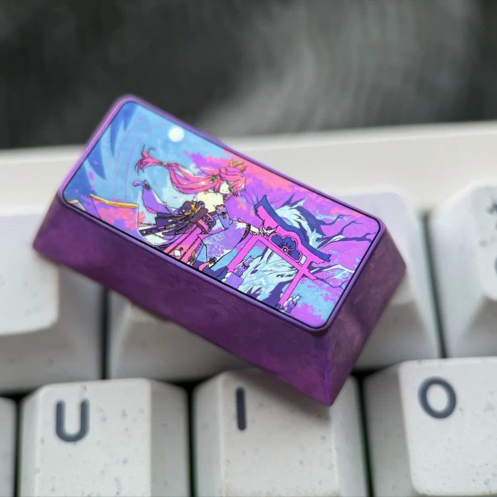 Explore the premium titanium Yae Miko keycap from various angles, highlighting its exquisite custom anime art and polished, luxurious finish.