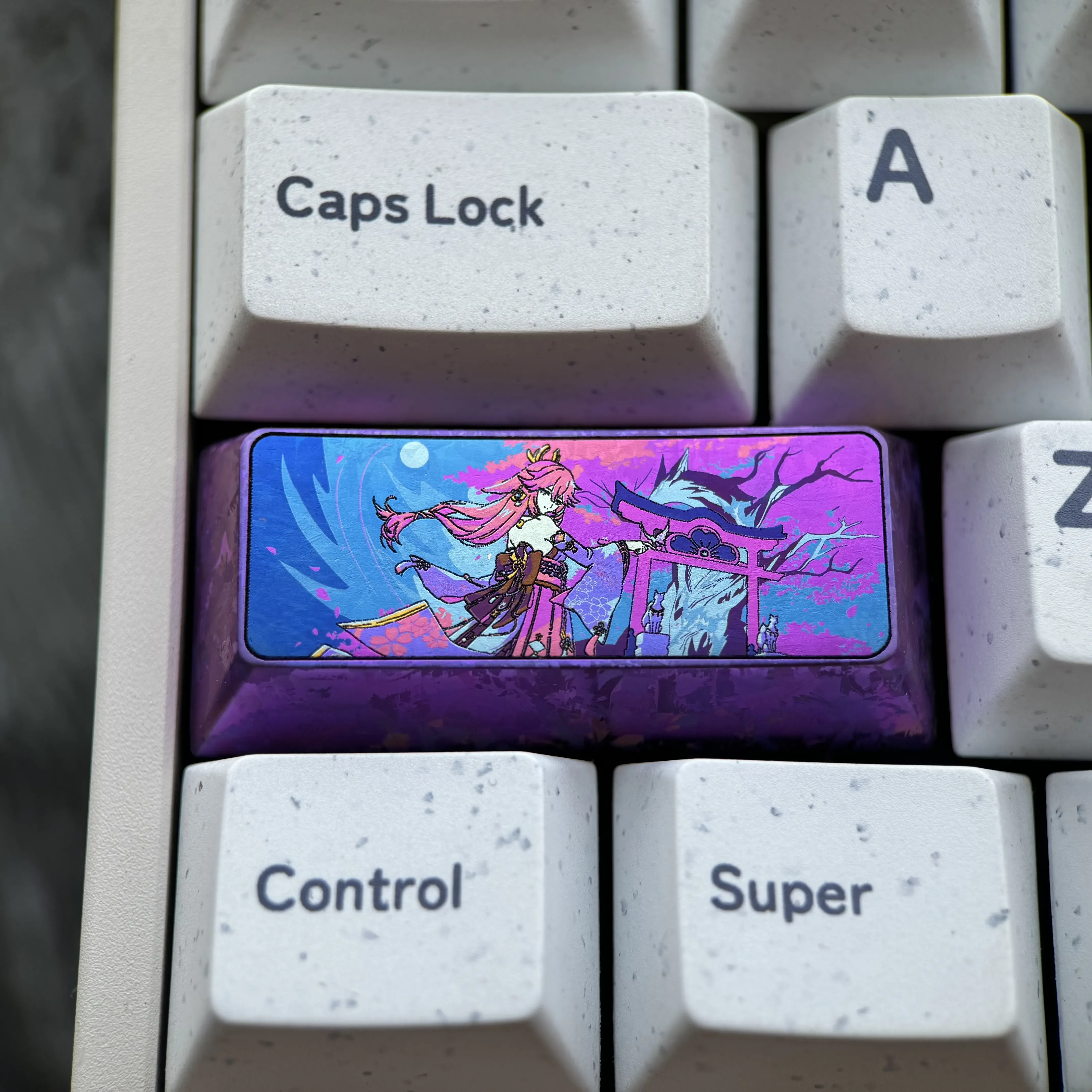 Exquisite Yae Miko Titanium Alloy 2.25U Enter keycap. Gallery displays vibrant Genshin Impact anime art on polished titanium.