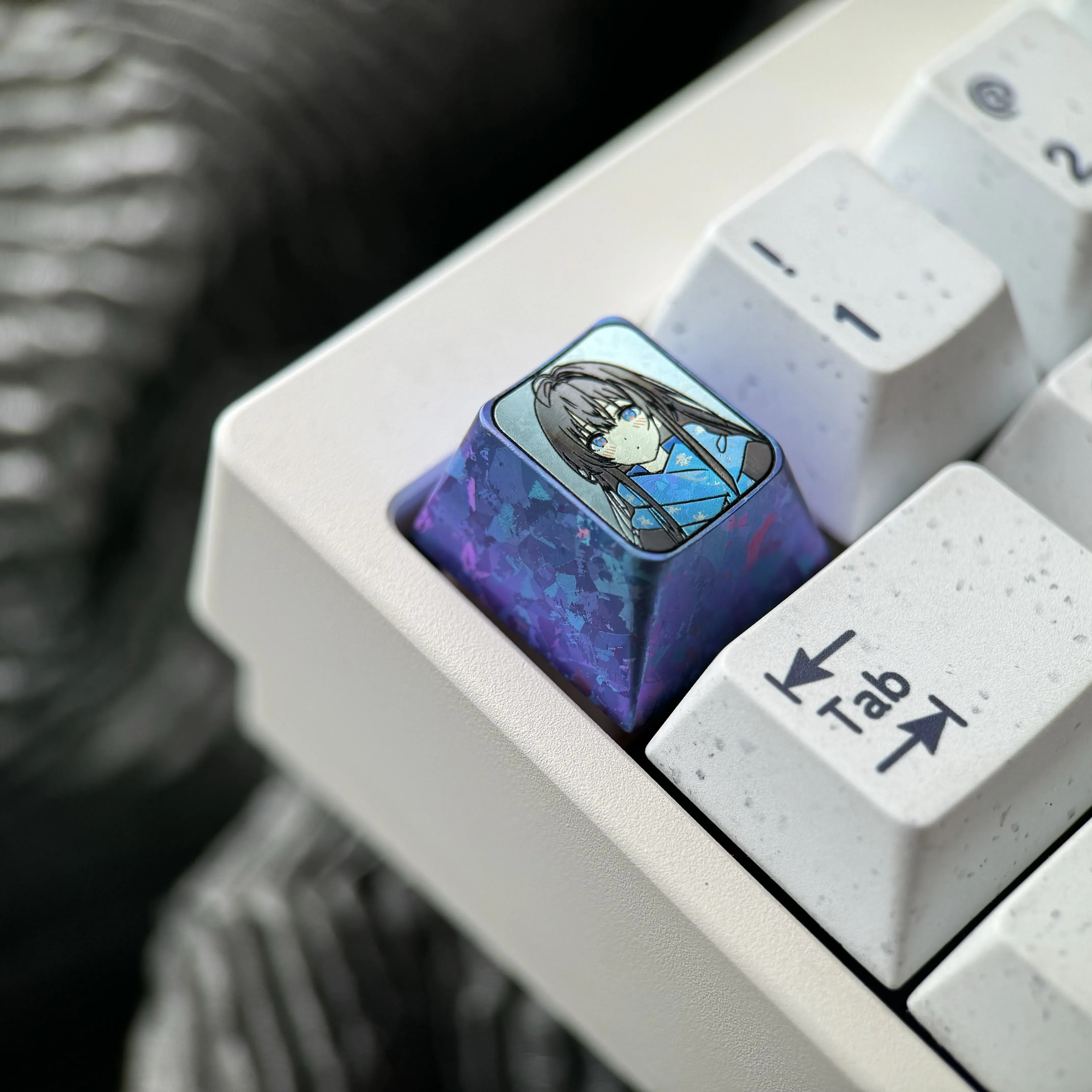 Exclusive Yukino Titanium Anime Keycap gallery, showcasing vibrant character art on polished titanium from various premium angles.