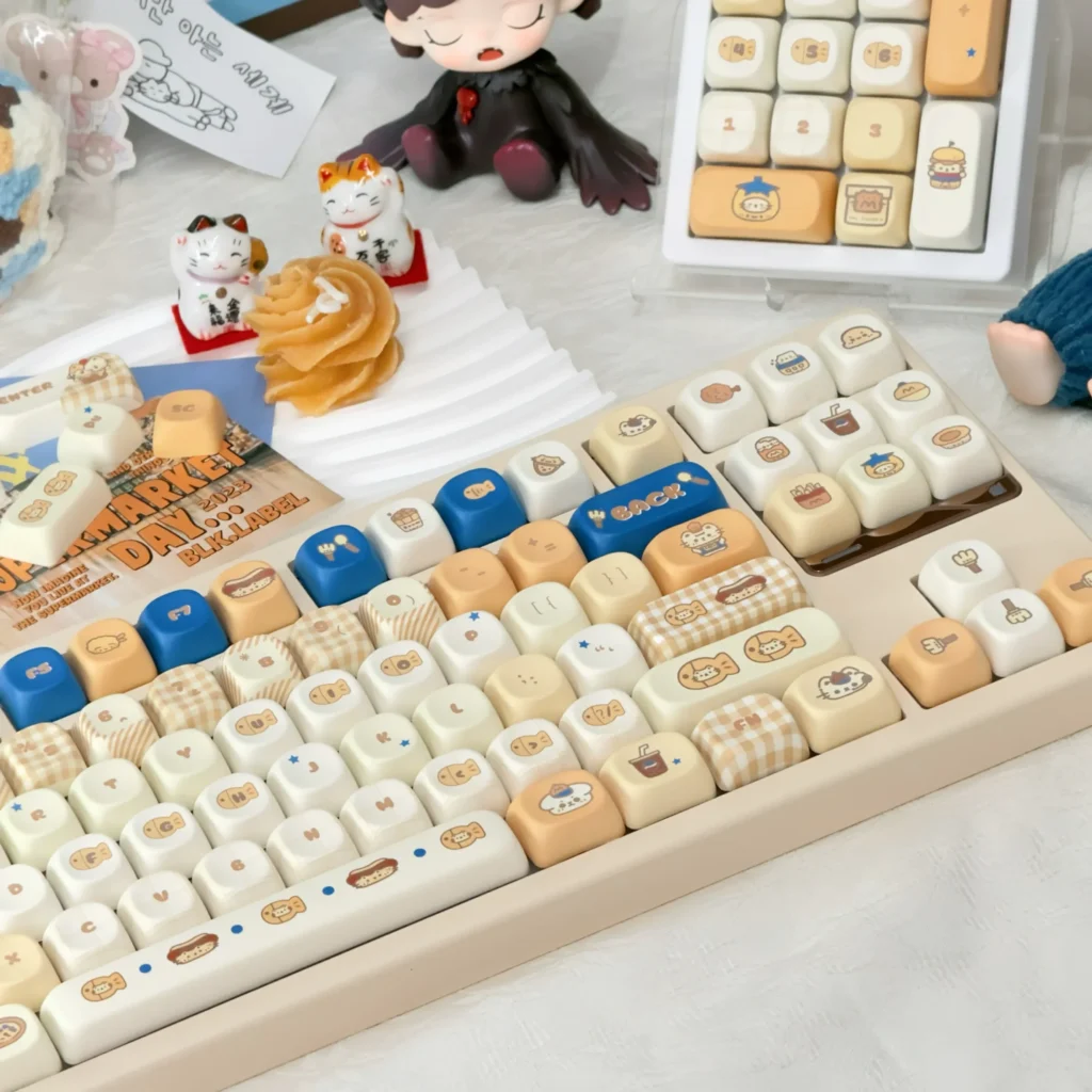 Yummy Delightful Cute PBT Keycaps Set, highlighting durable 5-sided dye-sublimation and playful food-inspired designs for a whimsical desktop.