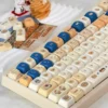 Yummy Delightful Cute PBT Keycaps set showcase vibrant food-inspired designs. Durable PBT and 5-sided dye-sublimation ensure lasting charm.