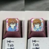Vibrant Ai Haibara titanium ESC keycap for mechanical keyboards, showcasing premium craftsmanship and detailed anime art.