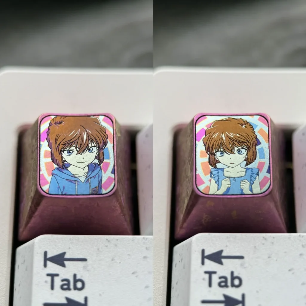 Vibrant Ai Haibara titanium ESC keycap for mechanical keyboards, showcasing premium craftsmanship and detailed anime art.