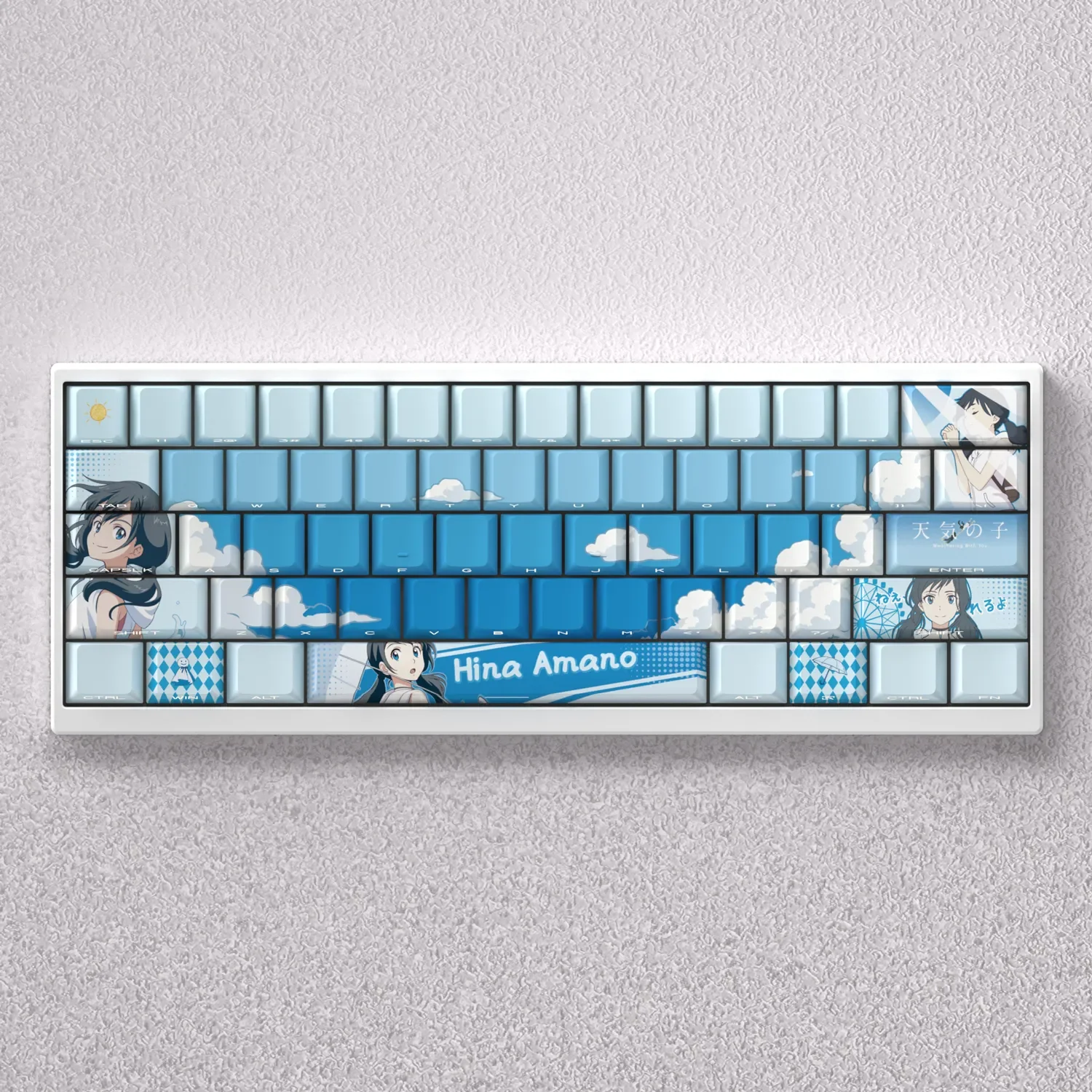 Multiple angles of the exclusive Hina Amano Keycap Set, showcasing its vibrant Weathering With You anime art.