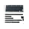 Premium Angular Shadow black PBT double-shot side-print keycaps set, elegantly illuminating their sleek, subtle shine-through legends.