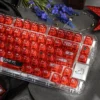 Dynamic silver-haired anime battle princess keycap set with vibrant dye-sub PC, showcasing its translucent frosted finish and premium details.