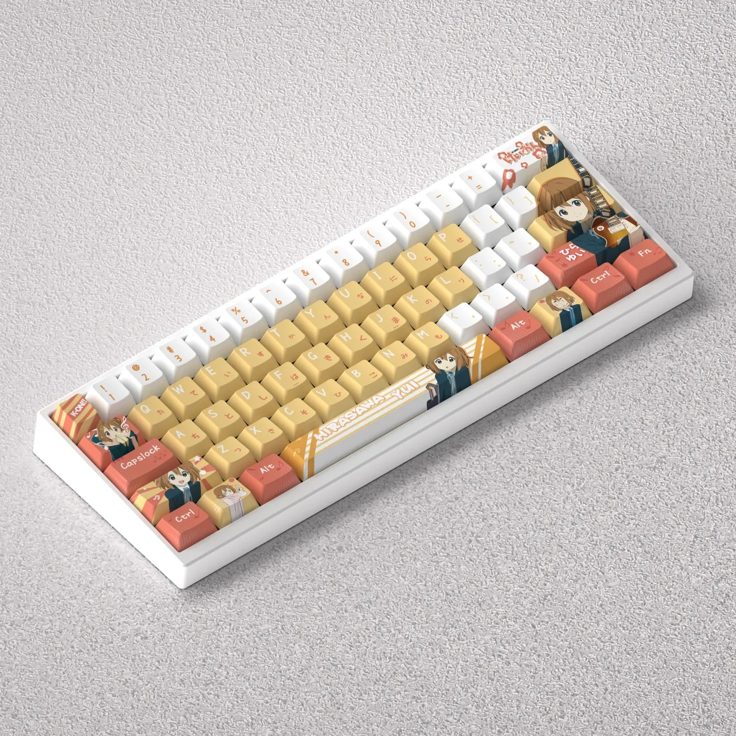 Multiple angles of the vibrant Hirasawa Yui K-On! PBT anime keycap set, displaying cute pastel character art for custom mechanical keyboards.