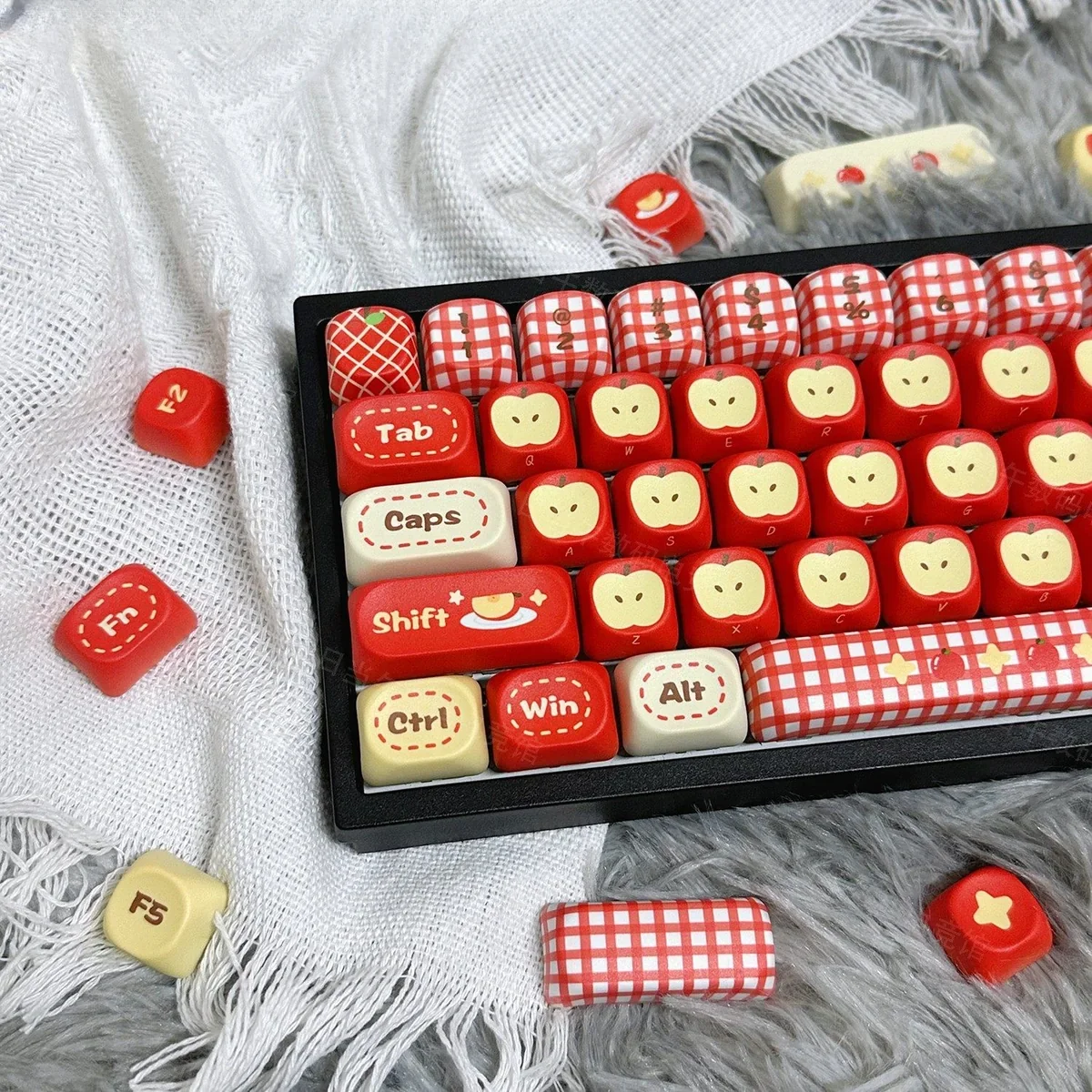 Artistic Apple Keycaps Set MOA profile, Rustic Town Set, featuring whimsical pastel apple orchard designs. Heartwarming pastoral theme, shown from a detail angles.