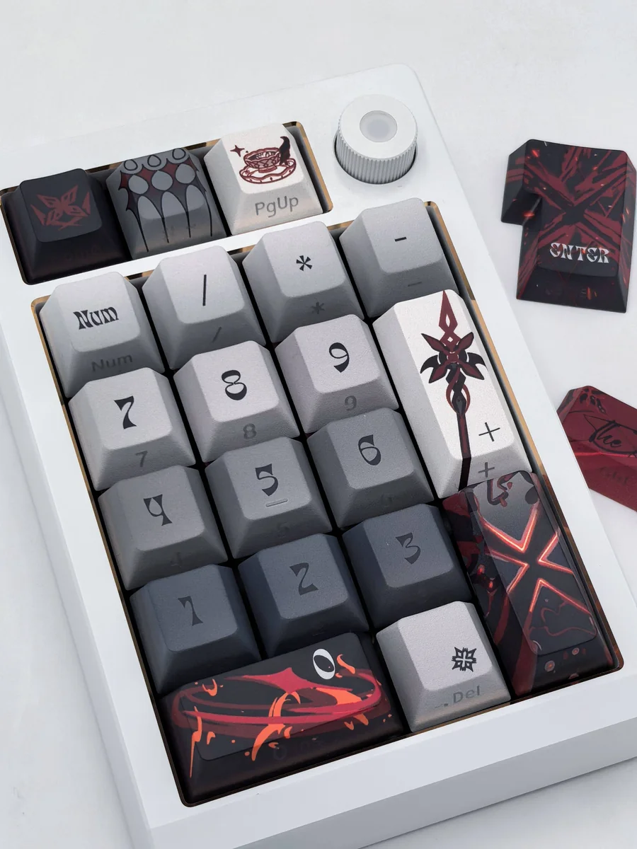 Close-up shots of the exclusive Arlecchino The Knave side-engraved keycap set, revealing the double-shot legends and dark, mysterious motifs from various angles.