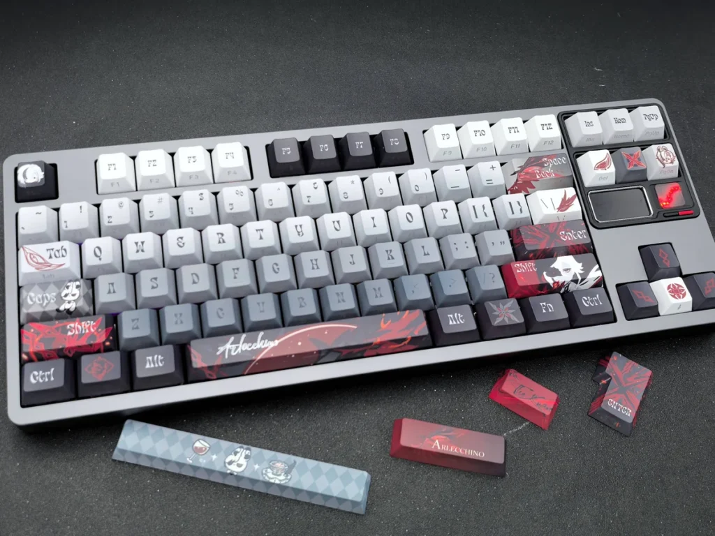 Close-up of premium Arlecchino The Knave keycap set, featuring subtle side-engraved legends and a mysterious dark aesthetic. Double-shot quality.