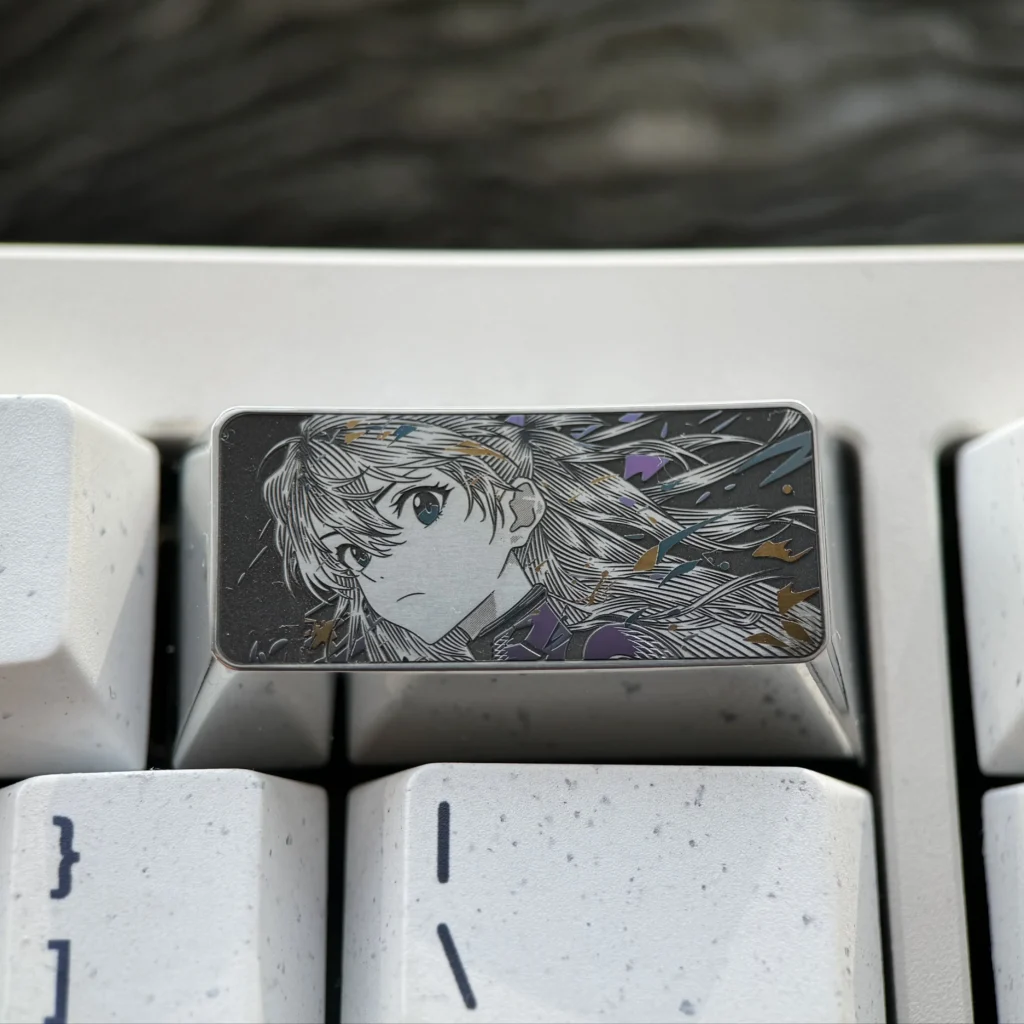 This product gallery image captures the premium alloy Asuka keycap, emphasizing its iconic Evangelion design and the meticulous precision-engraved design.