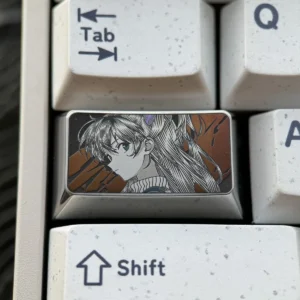 Asuka Keycap featuring precision-engraved Evangelion anime art, showcasing intricate metallic detail and a futuristic mech design.