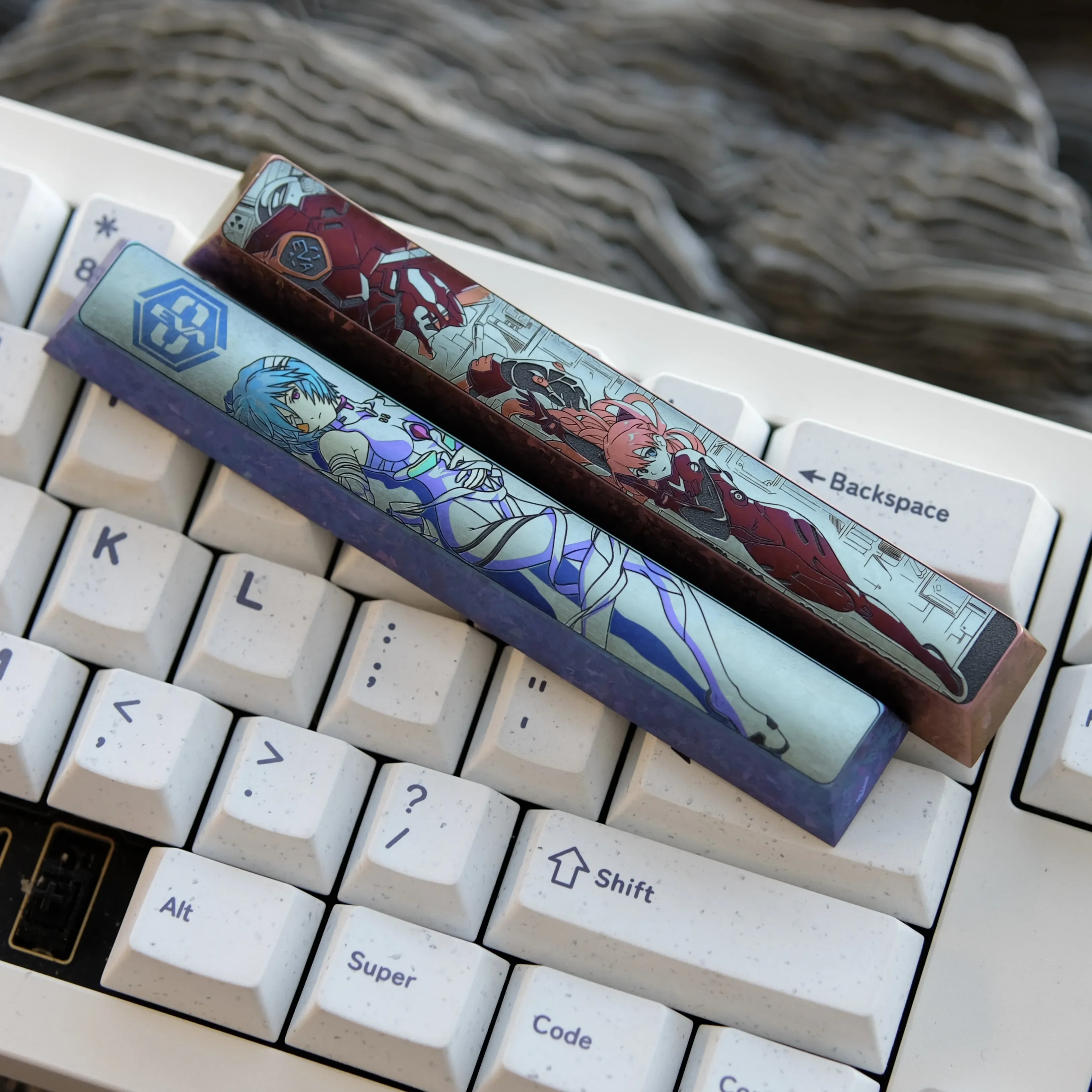 Handcrafted Asuka Titanium Keycap artisan space key. Deep red mecha artistry revealed from various angles, highlighting Evangelion detail.