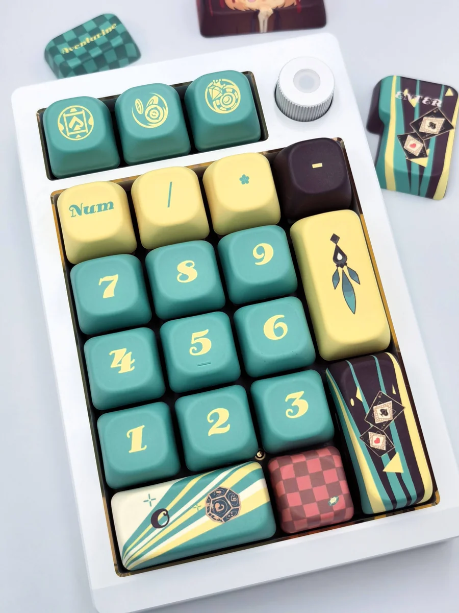 Aventurine FOA PBT Dye-Sub keycaps set, shown at an angle. Mystical green and gold flecks adorn the ergonomic sculpted FOA profile, creating an artistic keycaps.