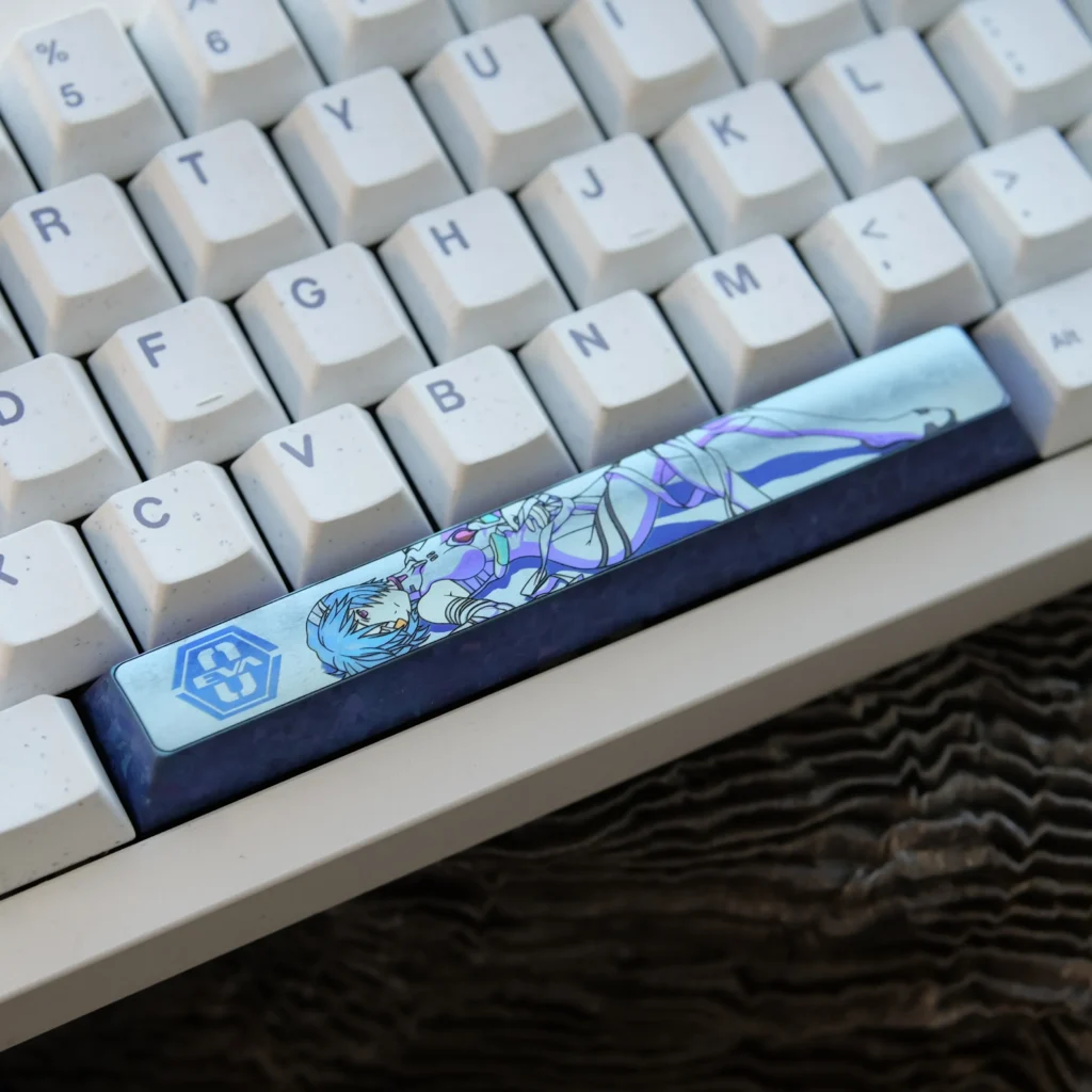 Iconic Ayanami Rei titanium space key keycap, featuring vibrant anime art and a polished, durable sci-fi aesthetic.