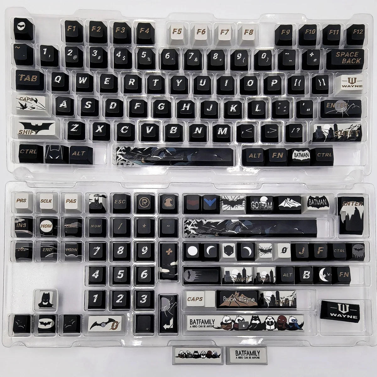 Side profile of the exclusive DC Batfamily Batman keycaps, emphasizing the dark, high-quality sculpted designs and vibrant Bat-symbol details.