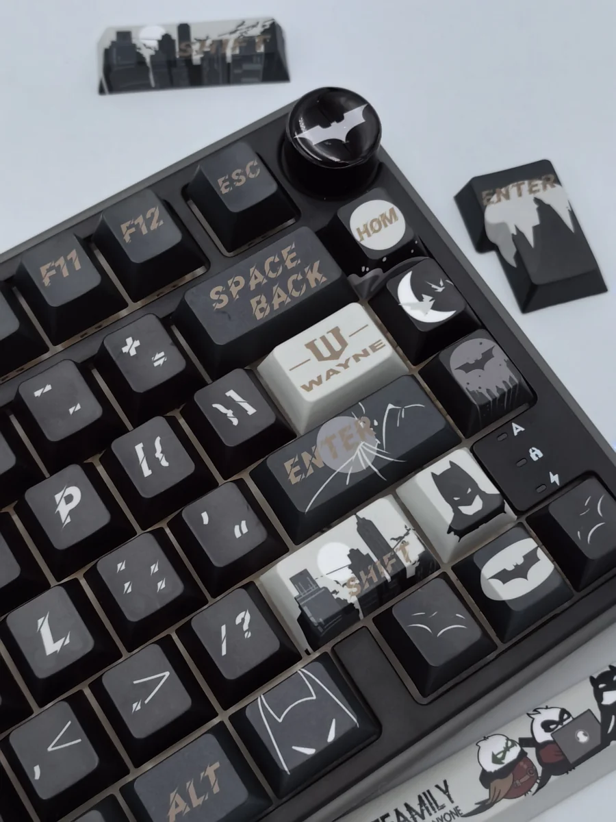 Exclusive DC Batfamily Batman keycaps set, premium quality, showcasing intricate dark iconography and vibrant character details from multiple angles.