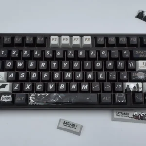 Exclusive DC Batfamily Batman keycaps set featuring iconic dark iconography with vibrant accents, showcasing this premium themed collection.