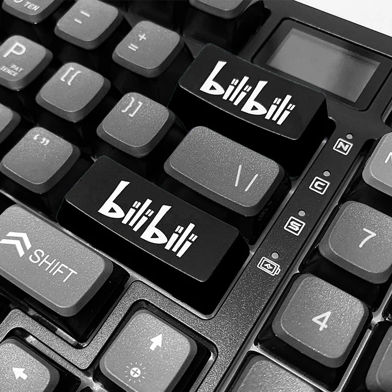 Dynamic views of the vibrant BiliBili RGB accent keycap, showcasing its iconic branding, vivid colors, and readiness for dazzling RGB lighting effects.