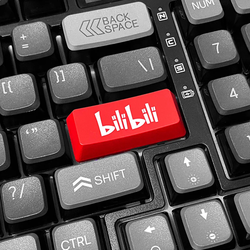 A collection of images displaying the vibrant BiliBili RGB accent keycap from various angles, highlighting its iconic design and RGB-ready glow.