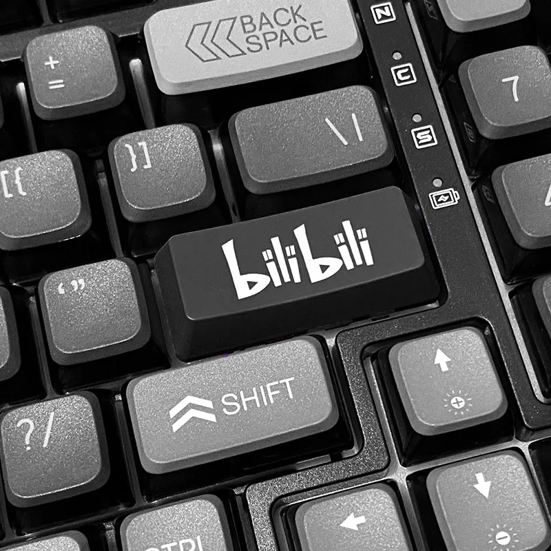 Vibrant BiliBili RGB accent keycaps displayed from various angles, highlighting the iconic branding and readiness for dynamic RGB lighting.
