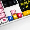 Vibrant Bocchi the Rock! Kessoku Band PBT keycaps set displayed from various angles, showcasing unique anime art for custom mechanical keyboards.