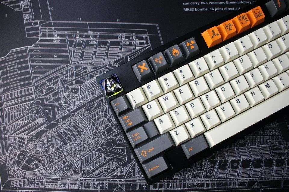 Bomber Desk Mat featuring an iconic stealth bomber design in tactical black and grey, optimized for oversized premium gaming performance.