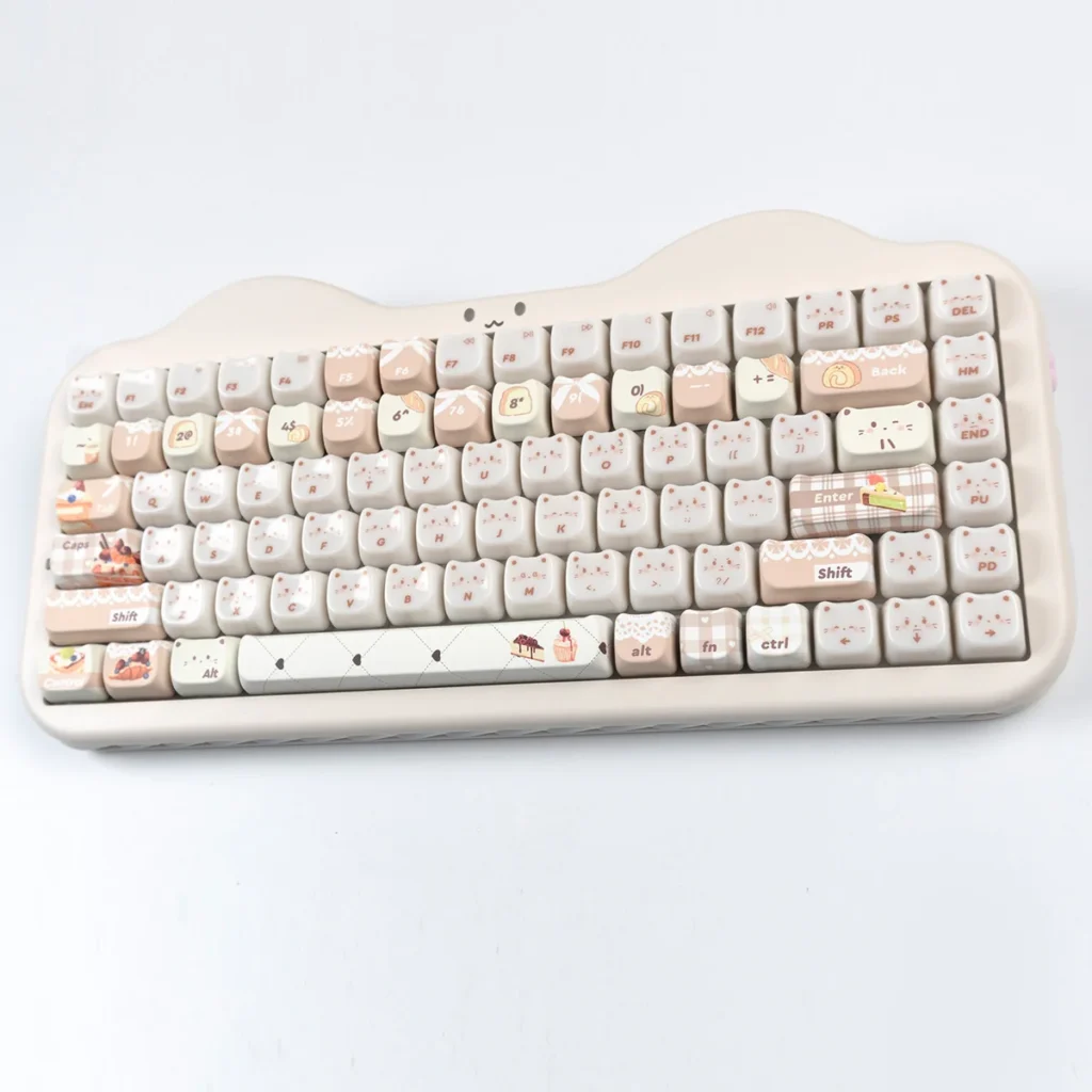 Adorable Baking Cat MAO Keycap Set, showcasing whimsical feline designs. These premium cat keycaps offer a smooth finish and vibrant RGB design.