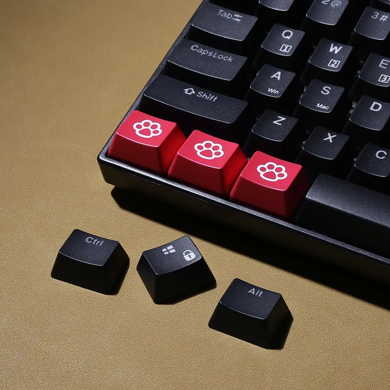 Cat Paw Keycap for mechanical keyboards, seen from different angles. Adorable, squishy translucent pads are backlit, adding premium feline artistry.