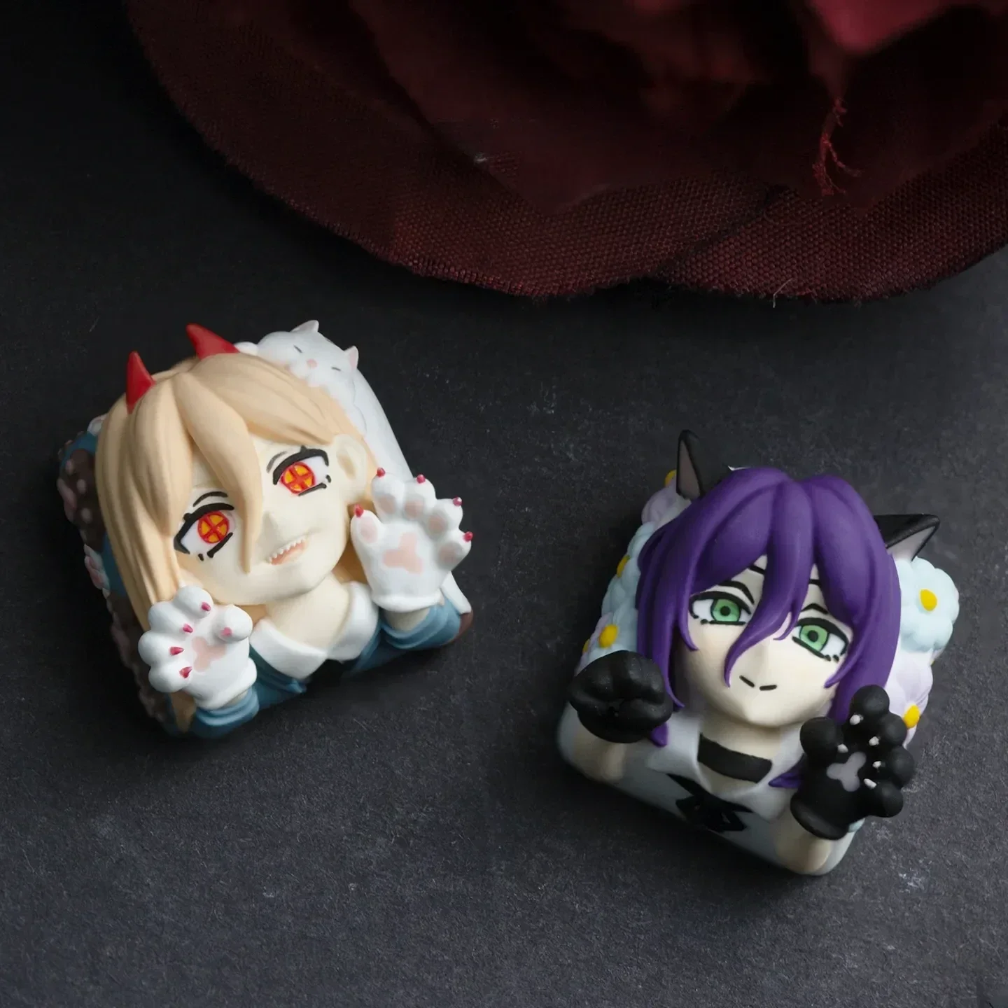 Multiple angles of the handcrafted resin Chainsaw Man Power keycap, showcasing its vibrant colors and intricate sculpted details for custom keyboard.