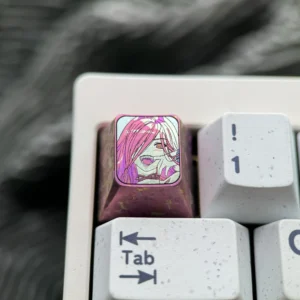 Vibrant Chainsaw Man Power titanium keycap, a premium anime keyboard accessory meticulously crafted with artistic detail for fans.