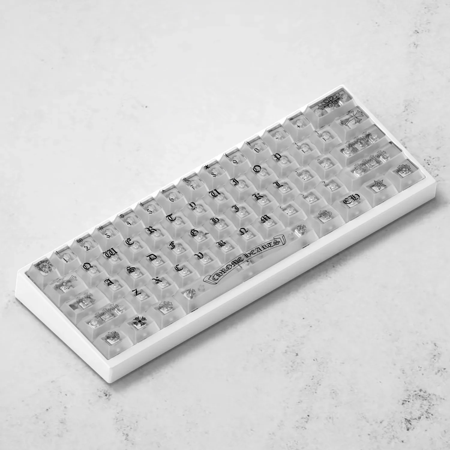 Collection of iconic Gothic Luxury Chrome Hearts keycaps set, frosted translucent PC material, showcased from multiple angles with an edgy, ethereal glow.