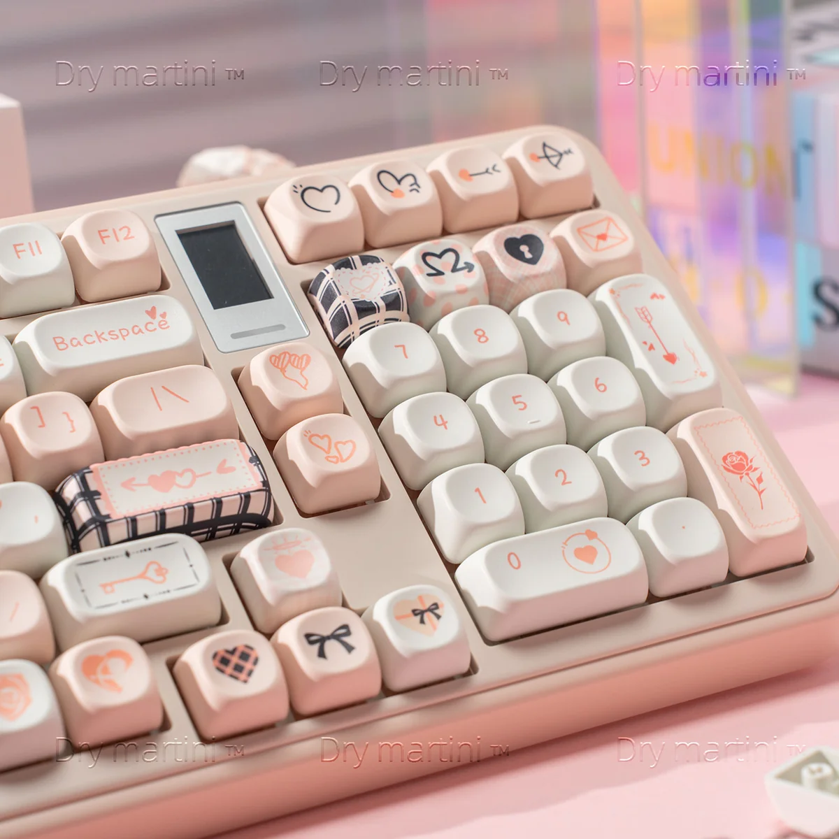 Dreamy black and pink Cupid Keycap Set displayed from an artistic angle, featuring playful angelic cherubs and hearts on high-quality PBT dye-sublimation.